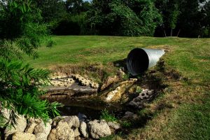 sewage coming out of pipe